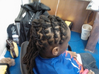 locs i did flat twisted to the side